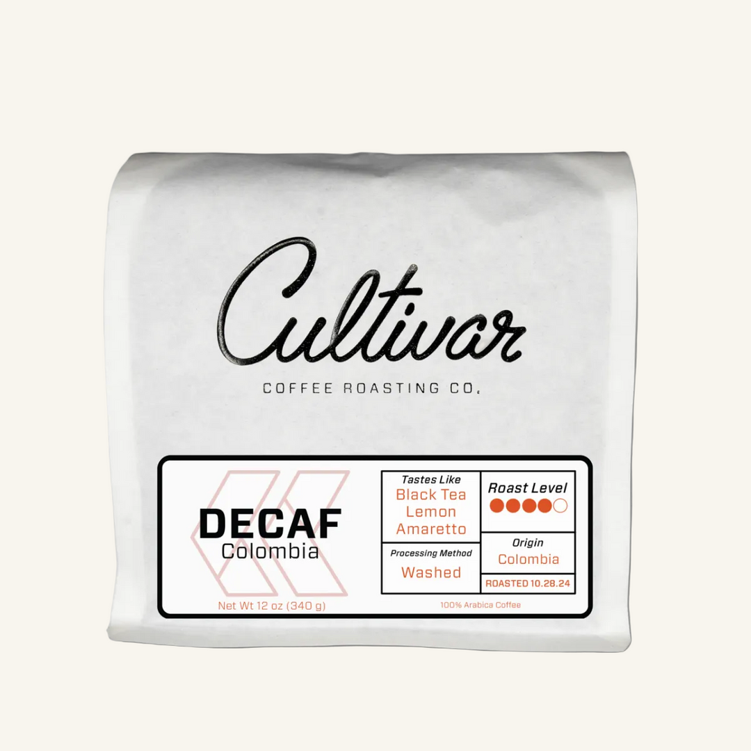 Retail bag of Cultivar Coffee Roasting Co.'s Decaf Colombia freshly roasted coffee beans
